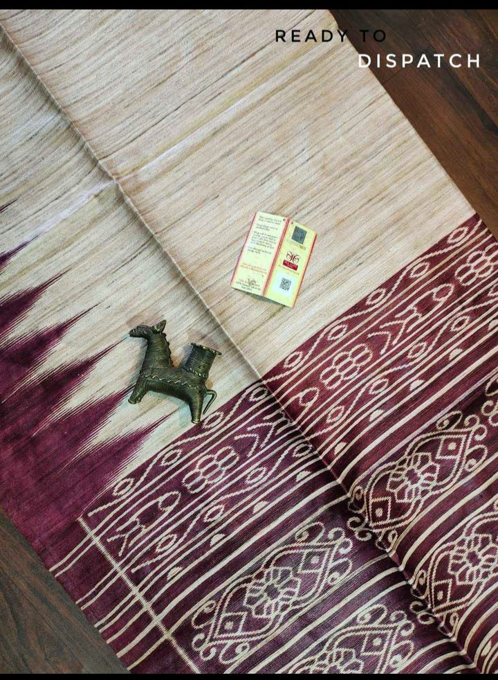 Pure tussar ghicha temple border ikkat print silk handloom saree with blouse pc.
Silk mark tag
