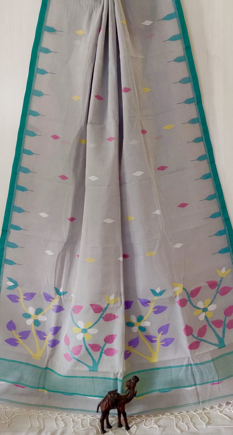 Very exclusive,Beautiful 100 Count pure
Cotton by Cotton Hand Spoon jamdani
with temple border with very
elegant jamdani motif pallu
Without bp