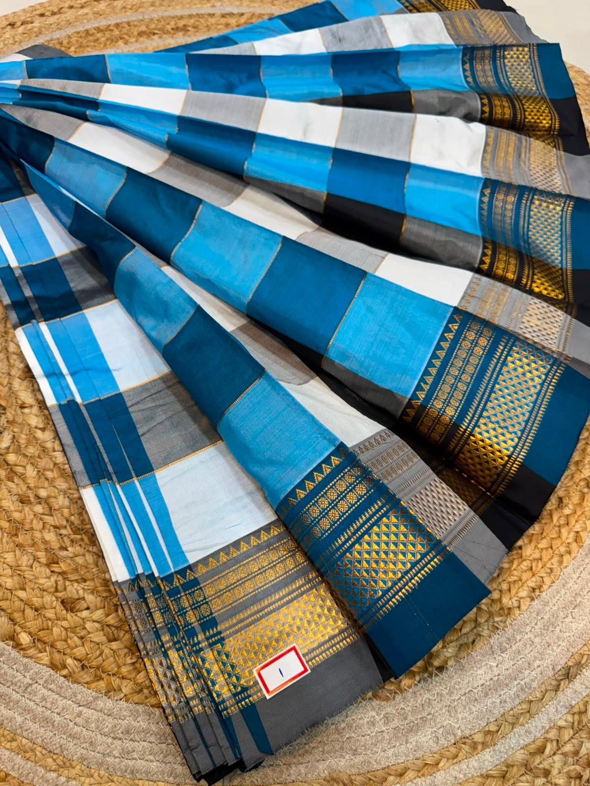 *ILKAL SAREE WITH SILK MARK*
Exclusive premium quality pure silk Multi colour checks with zari lines design ilkal saree With Fancy Temple design Jari Pallu and contrast blouse
6.10mtrs length
Premium quality ilkal saree