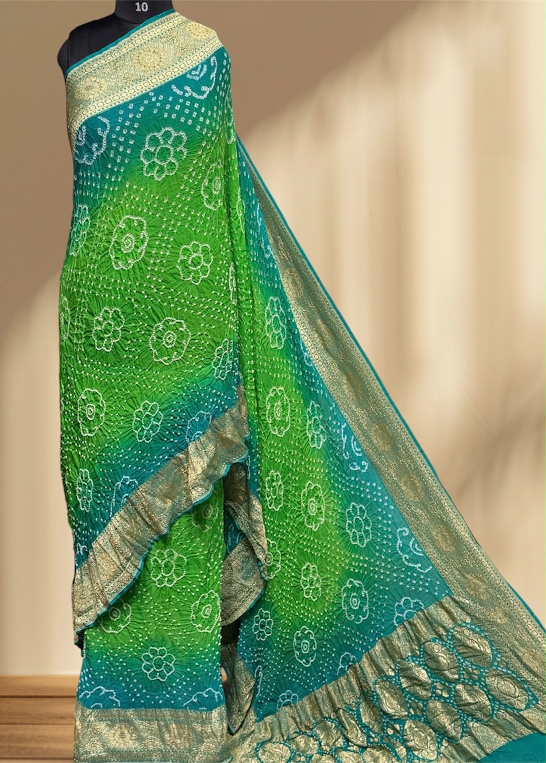 ** Banarasi Rai Bandhej Saree **
**Product Details:**
- **Fabric:** Khadi Georgette
- **Design:** Mix Pattern & Color, Real Nimzari, Beautiful Bandhej
- **Length:** 6.50 meters
- **Width:** 44-46 inches
- **Care:** Dry Clean Only