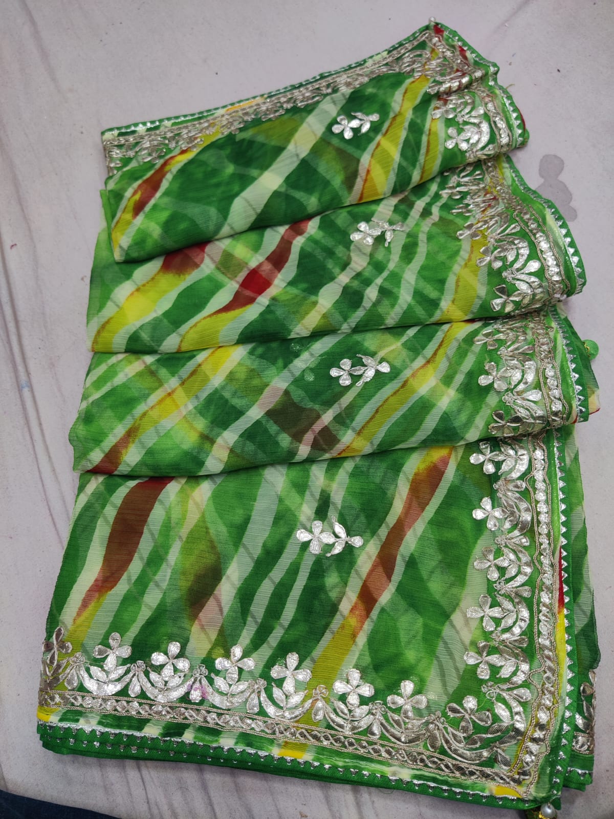 Pankhuri | lehariya chiffon saree with gota patti