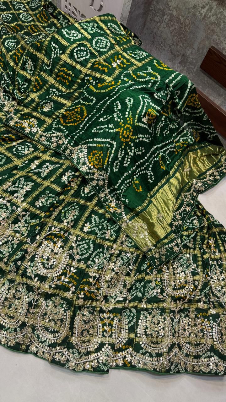 Bandhik | silk bandhej lehenga with gota patti work