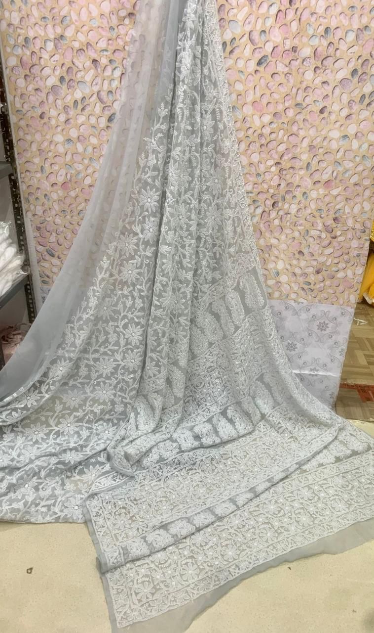 Woven Rhythms ~ Chikankari jaal on georgette saree