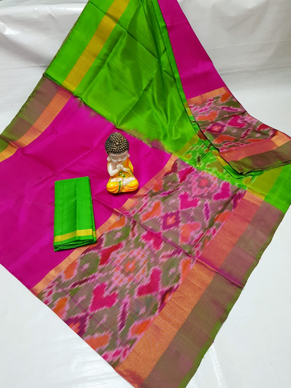 Dark purple with green uppada sarees with small pochampally border