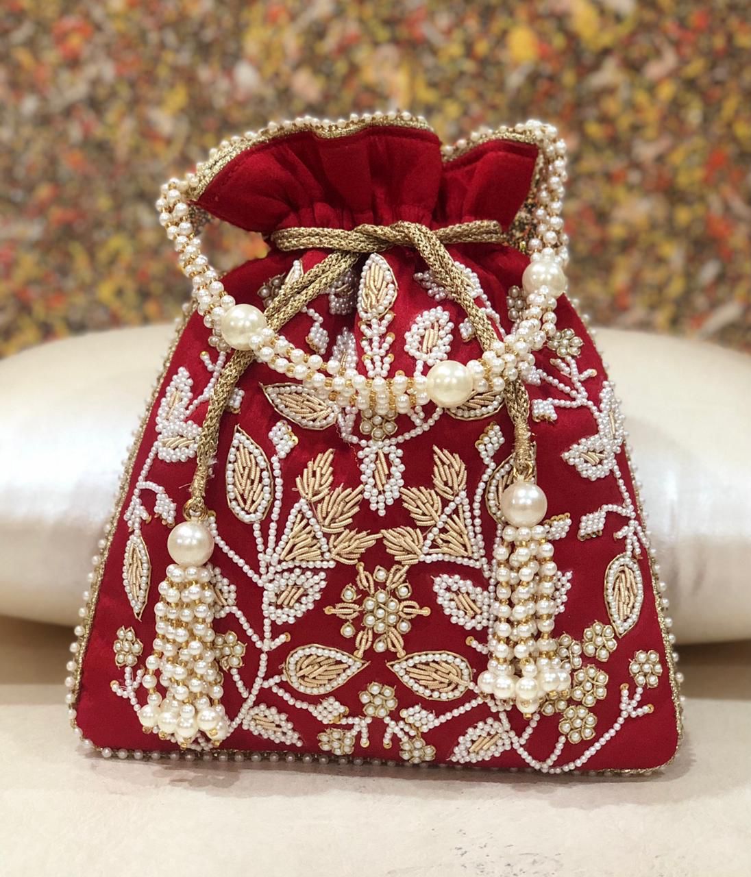 Reshmi | Heavy Zardosi Potlis in Red color