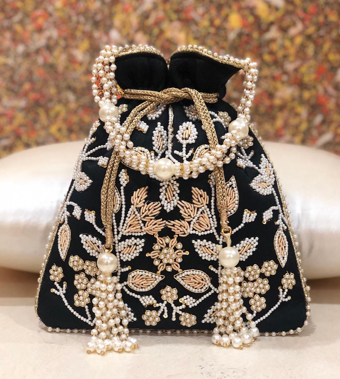 Lalita | Heavy Zardosi Potlis in Black color