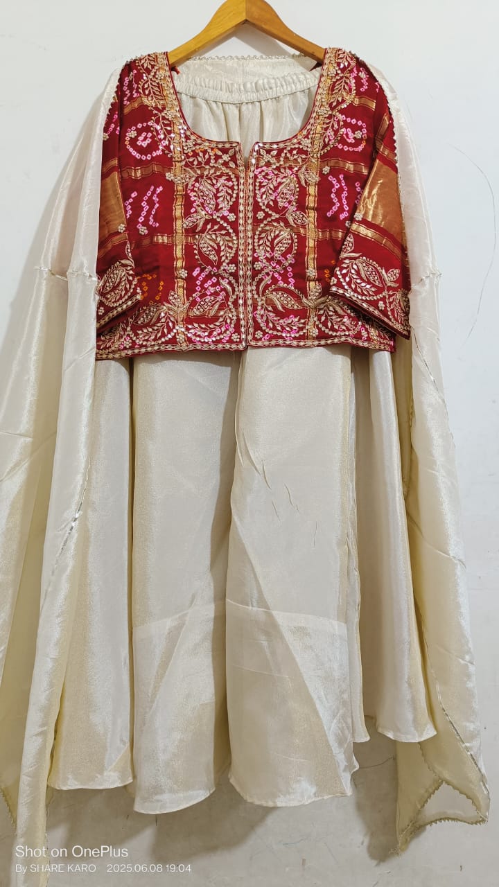 Bhavna | silk bandhej lehenga with gota patti work
