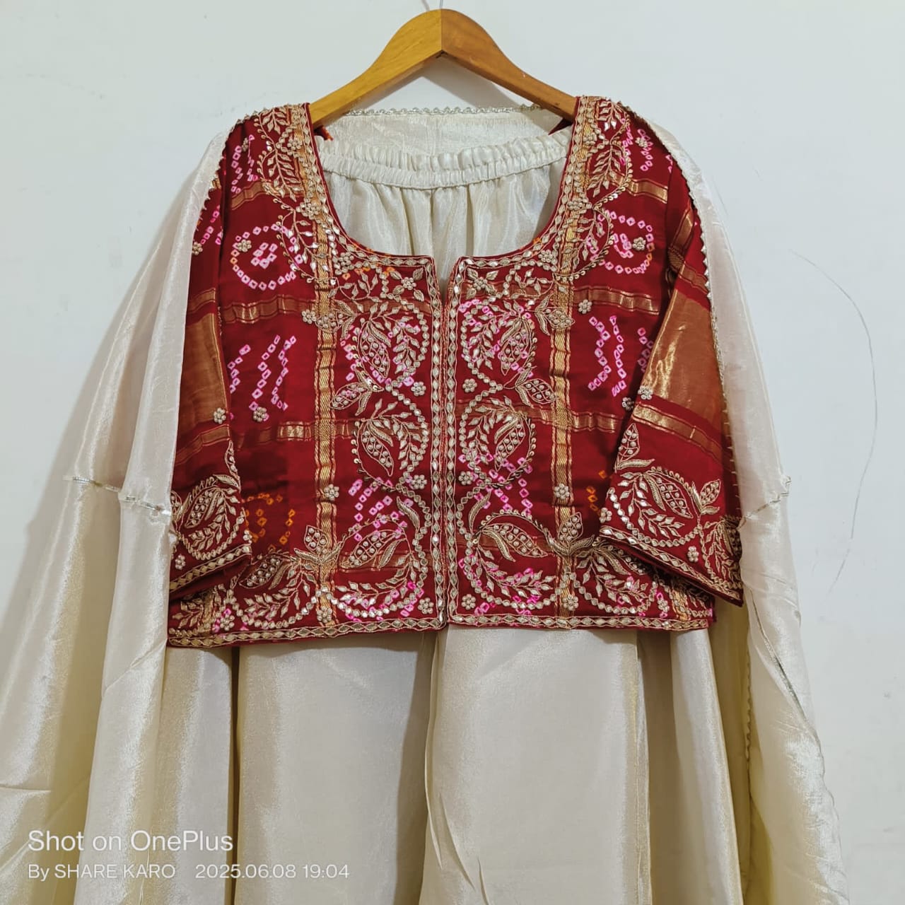 Bhavna | silk bandhej lehenga with gota patti work