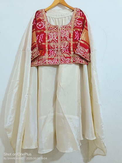 Bhavna | silk bandhej lehenga with gota patti work