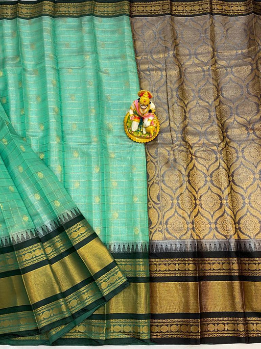 Aadhya |  Mangalagiri Tissue Checks Butta With Gadwal Border Sarees In Aquamarine Color
