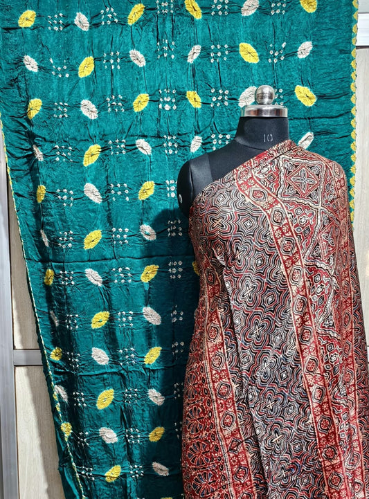 ✨ Pure Modal Silk Ajrakh Shibori saree✨*

*🌸 Premium Natural Dye Ajrakh Hand Block Print with Shibori hand bandhej saree*

*👗 Fabric Details*:

• *saree 6.50 miter . Full cut*..

*⭐ Highlights*

• 100% Premium Quality

• Natural Dye

• Authentic Ajrakh Hand Block Print

• Elegant Shibori Design

• Soft, Comfortable & Rich Finish