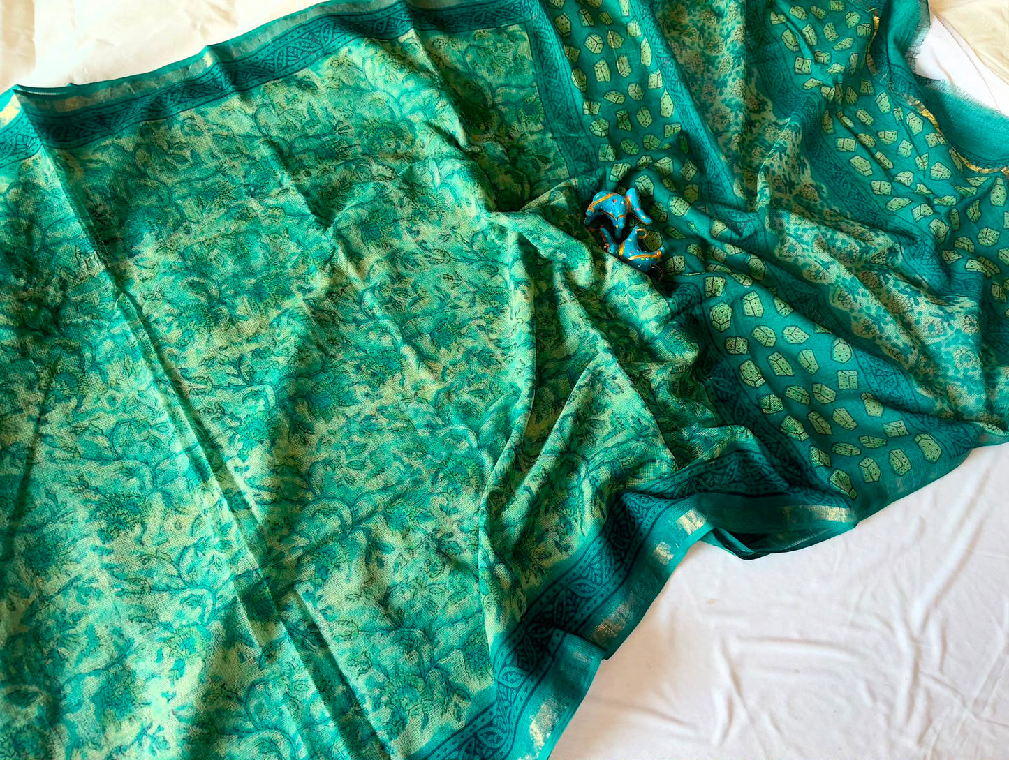 Summer special collection
Vanaspati ajark print

Kota saree new collection of Bagru print 
New collection Saree Kota Doriya .
Hand made 
Block print , Dabu print , Bagru print , vaspati print, ajark prijt
Saree length 5.5 mtr
Blouse.  80cm
Hand block printed.
