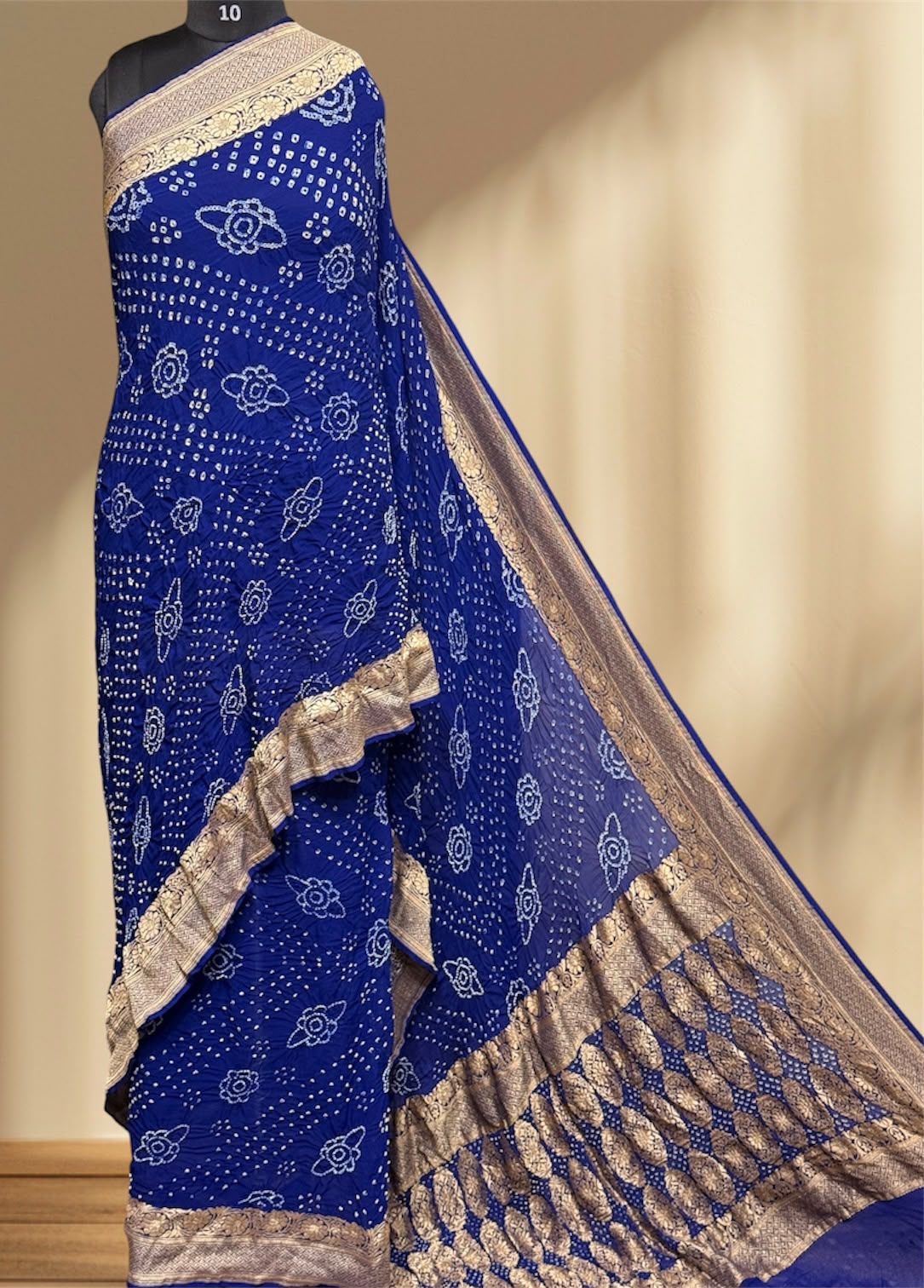 ** Banarasi Rai Bandhej Saree **

**Product Details:**
- **Fabric:** Khadi Georgette
- **Design:** Mix Pattern & Color, Real Nimzari, Beautiful Bandhej
- **Length:** 6.50 meters
- **Width:** 44-46 inches
- **Care:** Dry Clean Only