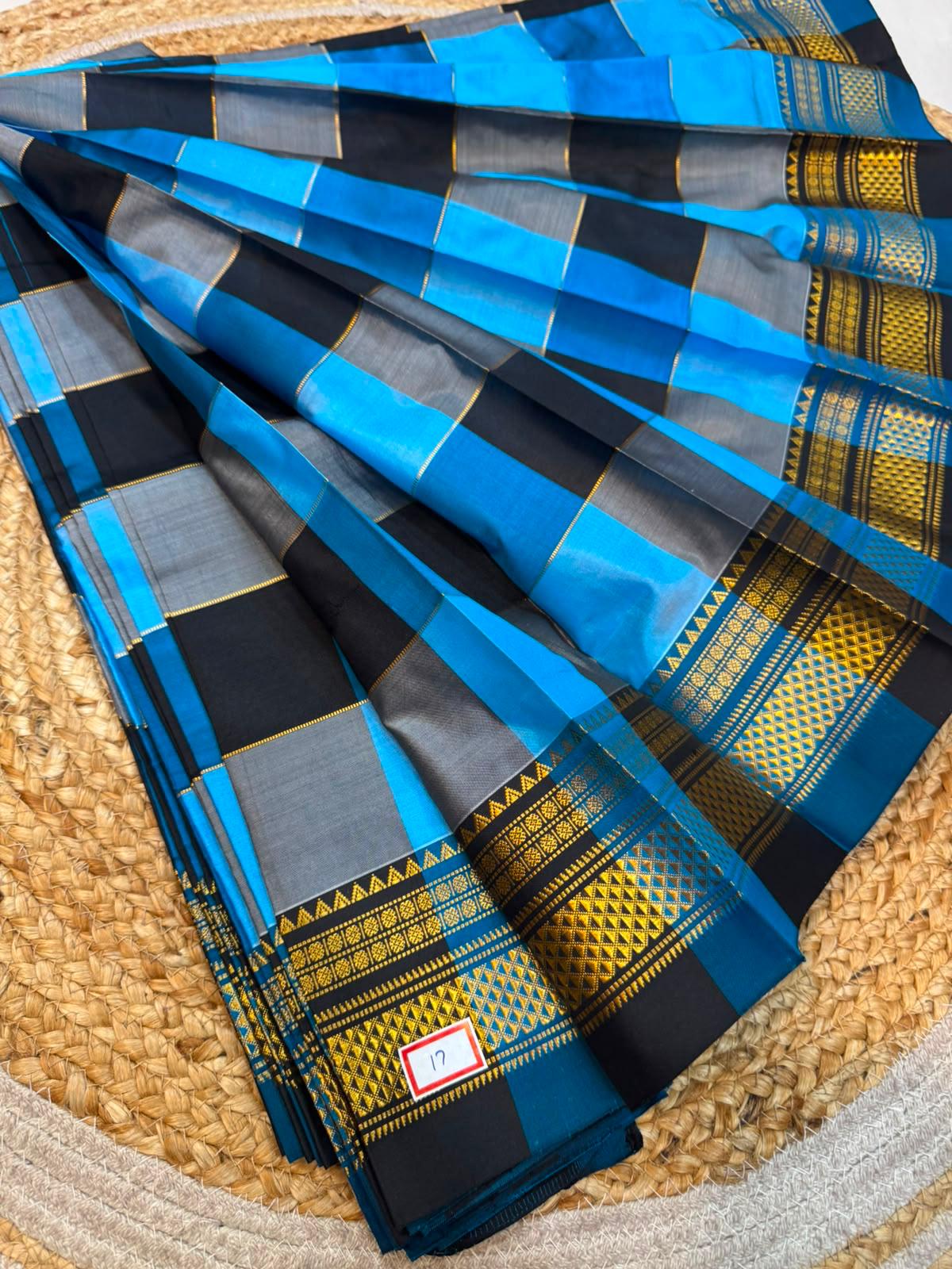 *ILKAL SAREE WITH SILK MARK* 

Exclusive premium quality pure silk Multi colour checks with zari lines design ilkal saree With Fancy Temple design Jari Pallu and contrast blouse 
6.10mtrs length 
Premium quality ilkal saree 
