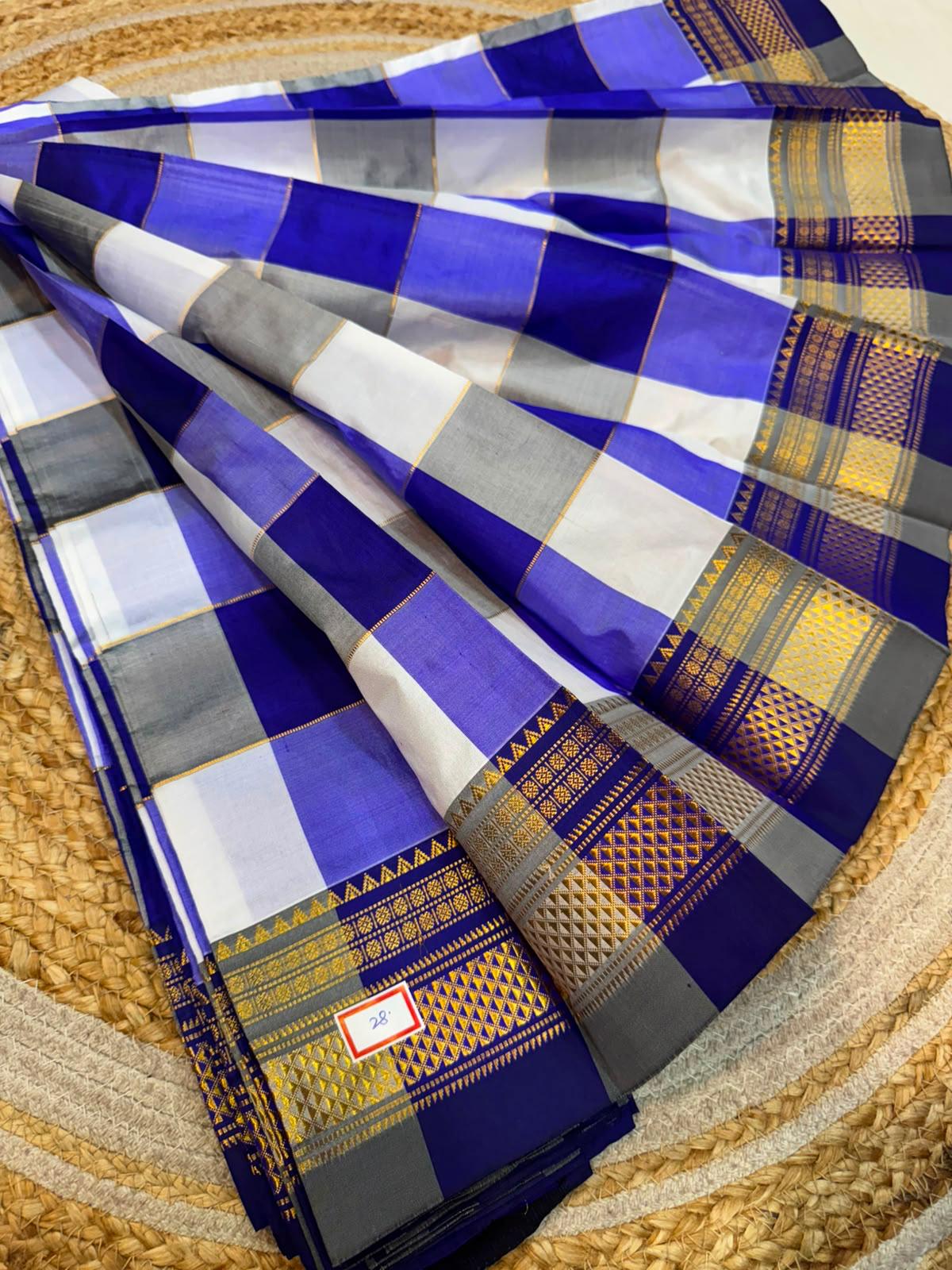 *ILKAL SAREE WITH SILK MARK* 

Exclusive premium quality pure silk Multi colour checks with zari lines design ilkal saree With Fancy Temple design Jari Pallu and contrast blouse 
6.10mtrs length 
Premium quality ilkal saree 
