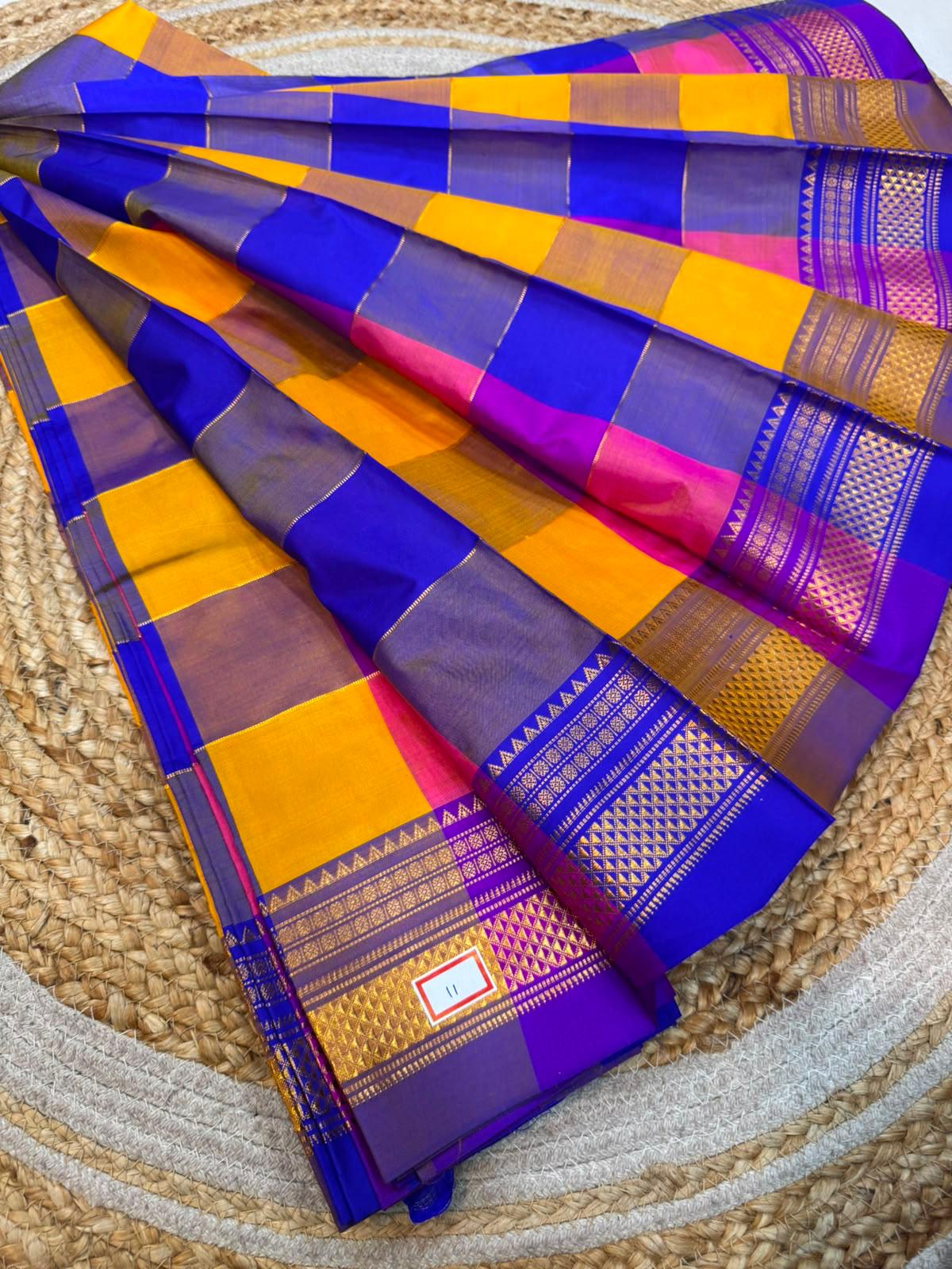 *ILKAL SAREE WITH SILK MARK* 

Exclusive premium quality pure silk Multi colour checks with zari lines design ilkal saree With Fancy Temple design Jari Pallu and contrast blouse 
6.10mtrs length 
Premium quality ilkal saree 
