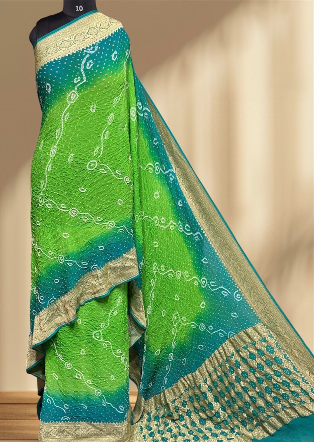 ** Banarasi Rai Bandhej Saree **

**Product Details:**
- **Fabric:** Khadi Georgette
- **Design:** Mix Pattern & Color, Real Nimzari, Beautiful Bandhej
- **Length:** 6.50 meters
- **Width:** 44-46 inches
- **Care:** Dry Clean Only
