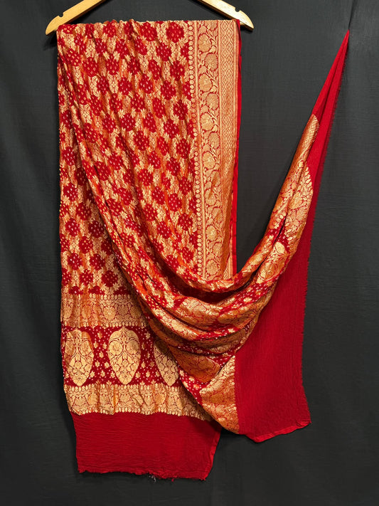 **Nim Zari Bandhej Dupatta**
- **Fabric:** handwoven Georgette
- **Design:** Beautiful Bandhej, Real Nimzari
- **Quality:** Best quality & colour 
- ** colour:** pastel & Dark
**Description:**
- **Length:** 2.50 meters, full length
- **Use:** Dress & Lehenga Choli Dupatta