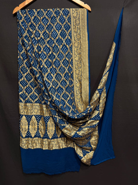 **Nim Zari Bandhej Dupatta**
- **Fabric:** handwoven Georgette
- **Design:** Beautiful Bandhej, Real Nimzari
- **Quality:** Best quality & colour 
- ** colour:** pastel & Dark
**Description:**
- **Length:** 2.50 meters, full length
- **Use:** Dress & Lehenga Choli Dupatta