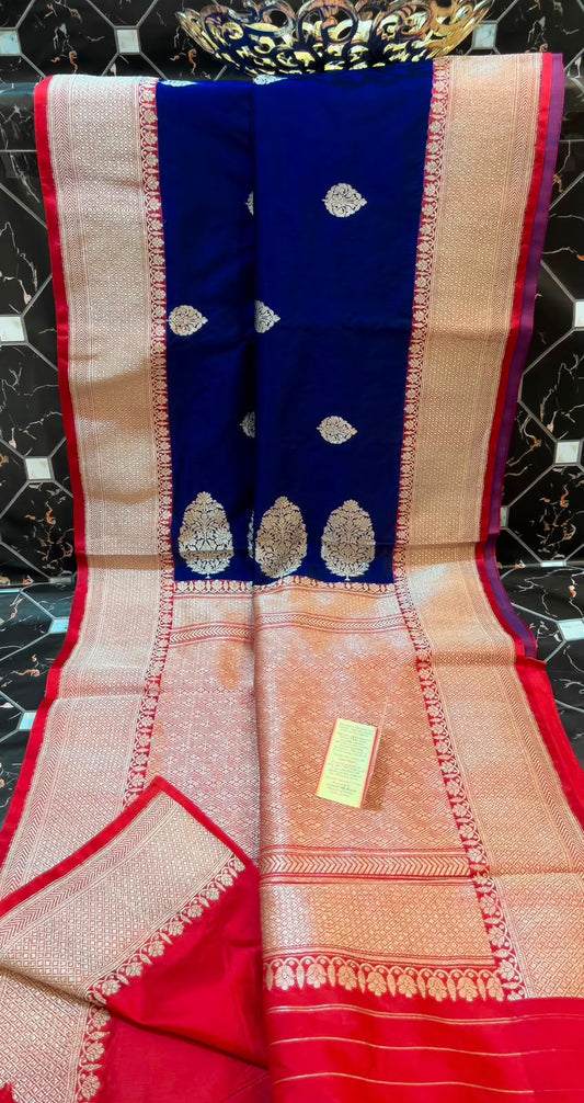 BIG OFFER | EXCLUSIVE HANDLOOM PURE KATAN SILK
• All-over Zari Booti & Koniya
• Antique Zari Kaduwa Border
• Rich Pallu
• Silk Mark Certified
• Lightweight