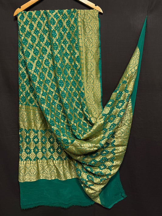 **Nim Zari Bandhej Dupatta**
- **Fabric:** handwoven Georgette
- **Design:** Beautiful Bandhej, Real Nimzari
- **Quality:** Best quality & colour 
- ** colour:** pastel & Dark
**Description:**
- **Length:** 2.50 meters, full length
- **Use:** Dress & Lehenga Choli Dupatta