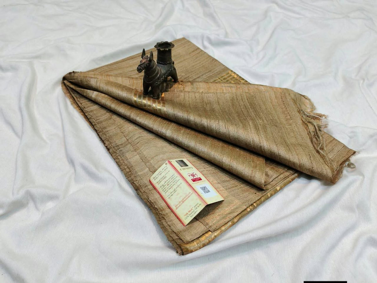 Pure tussar ghicha silk handloom saree with blouse pc.
Silk mark tag 
