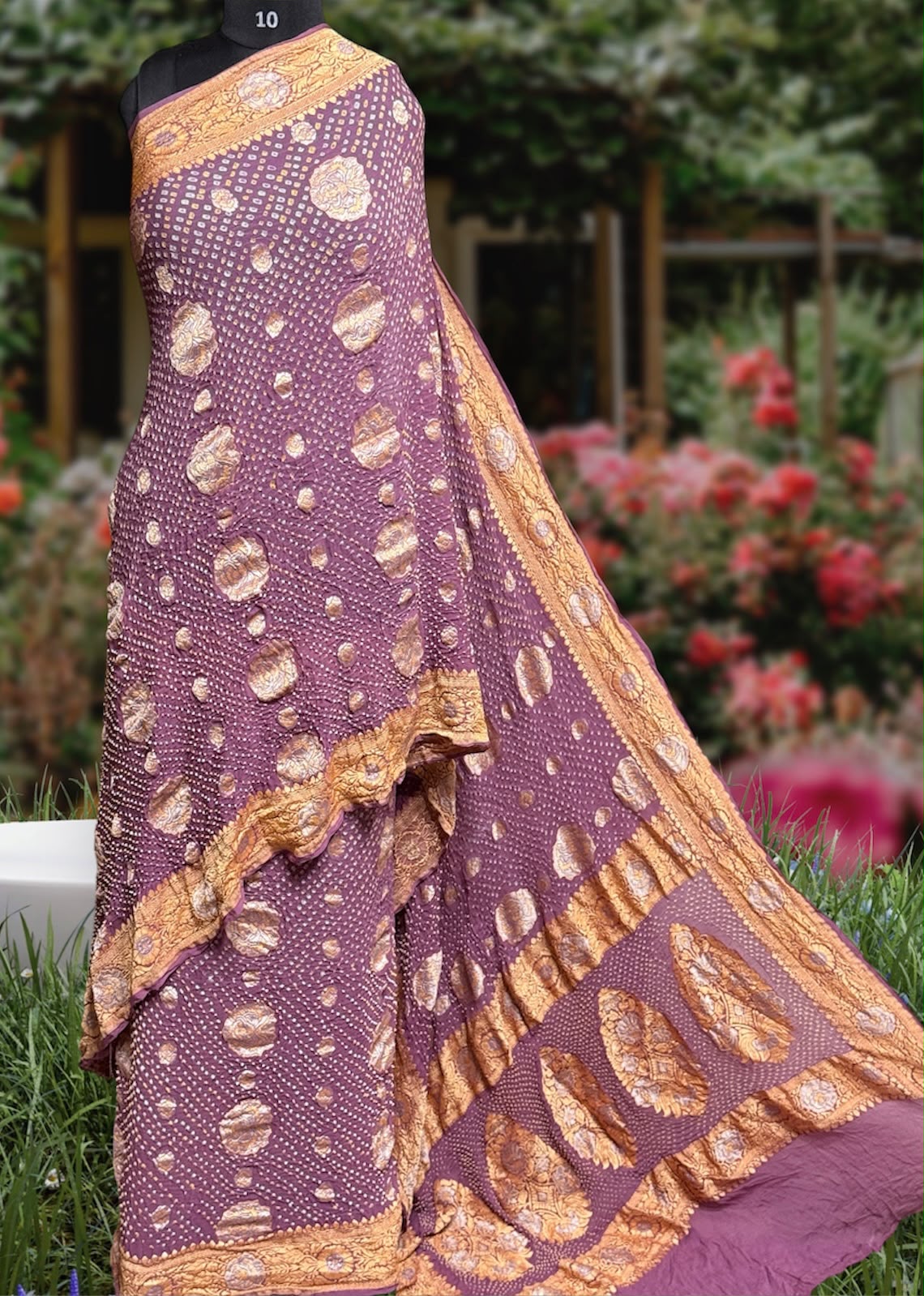 Sona Roopa rai Designer Bandhej Saree **

**Product Details:**
- **Fabric:** Khadi Georgette
- **Design:** Traditional rai aabadal  bandhej Real Nimzari, Beautiful Bandhej
- ** Pallu:** Designer silver Gold zari
- **Length:** 6.50 meters
- **Width:** 44-46 inches
- **Care:** Dry Clean Only
- ** colour:** ( Dark ) & ( light )