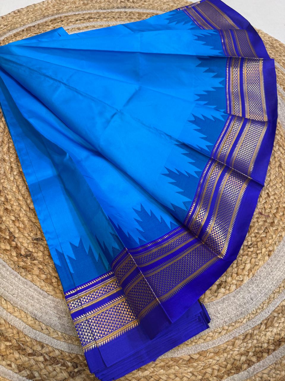 
*Big Temple Border Ilkal*

Exclusive silk ilkal saree 
Pure silk big temple border design superior quality ilkal saree
With contrast blouse 
6.10mtrs length 
Full body pure silk Border, pallu & blouse semi silk 