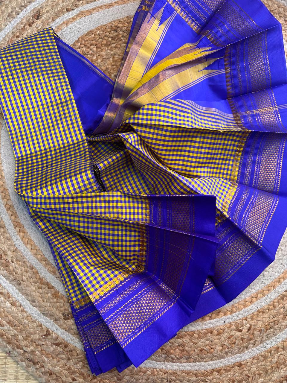 Material - pure silk 
Border - chikki paras
Saree Name -ilkal pure silk small checks with small temple border saree
Pallu -multi tope silk pallu
Blouse -contrast
Handloom -yes
Saree length- 6.2