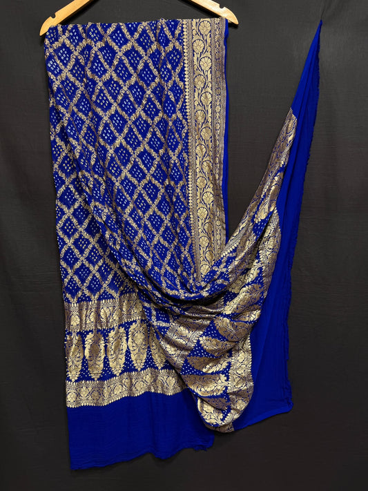 **Nim Zari Bandhej Dupatta**
- **Fabric:** handwoven Georgette
- **Design:** Beautiful Bandhej, Real Nimzari
- **Quality:** Best quality & colour 
- ** colour:** pastel & Dark
**Description:**
- **Length:** 2.50 meters, full length
- **Use:** Dress & Lehenga Choli Dupatta