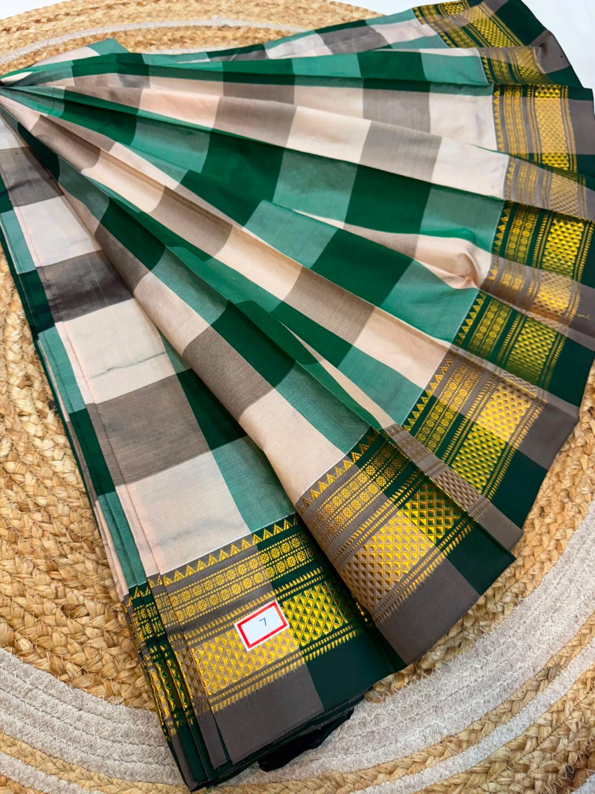 *ILKAL SAREE WITH SILK MARK* 

Exclusive premium quality pure silk Multi colour checks with zari lines design ilkal saree With Fancy Temple design Jari Pallu and contrast blouse 
6.10mtrs length 
Premium quality ilkal saree 
