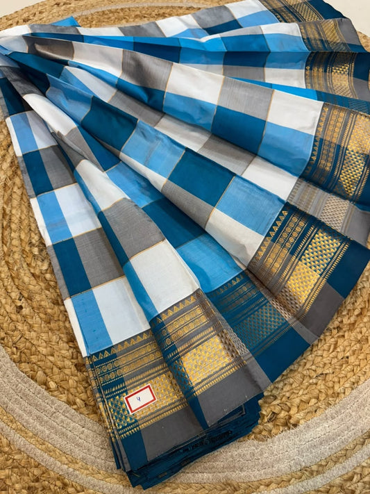 *ILKAL SAREE WITH SILK MARK* 

Exclusive premium quality pure silk Multi colour checks with zari lines design ilkal saree With Fancy Temple design Jari Pallu and contrast blouse 
6.10mtrs length 
Premium quality ilkal saree 
