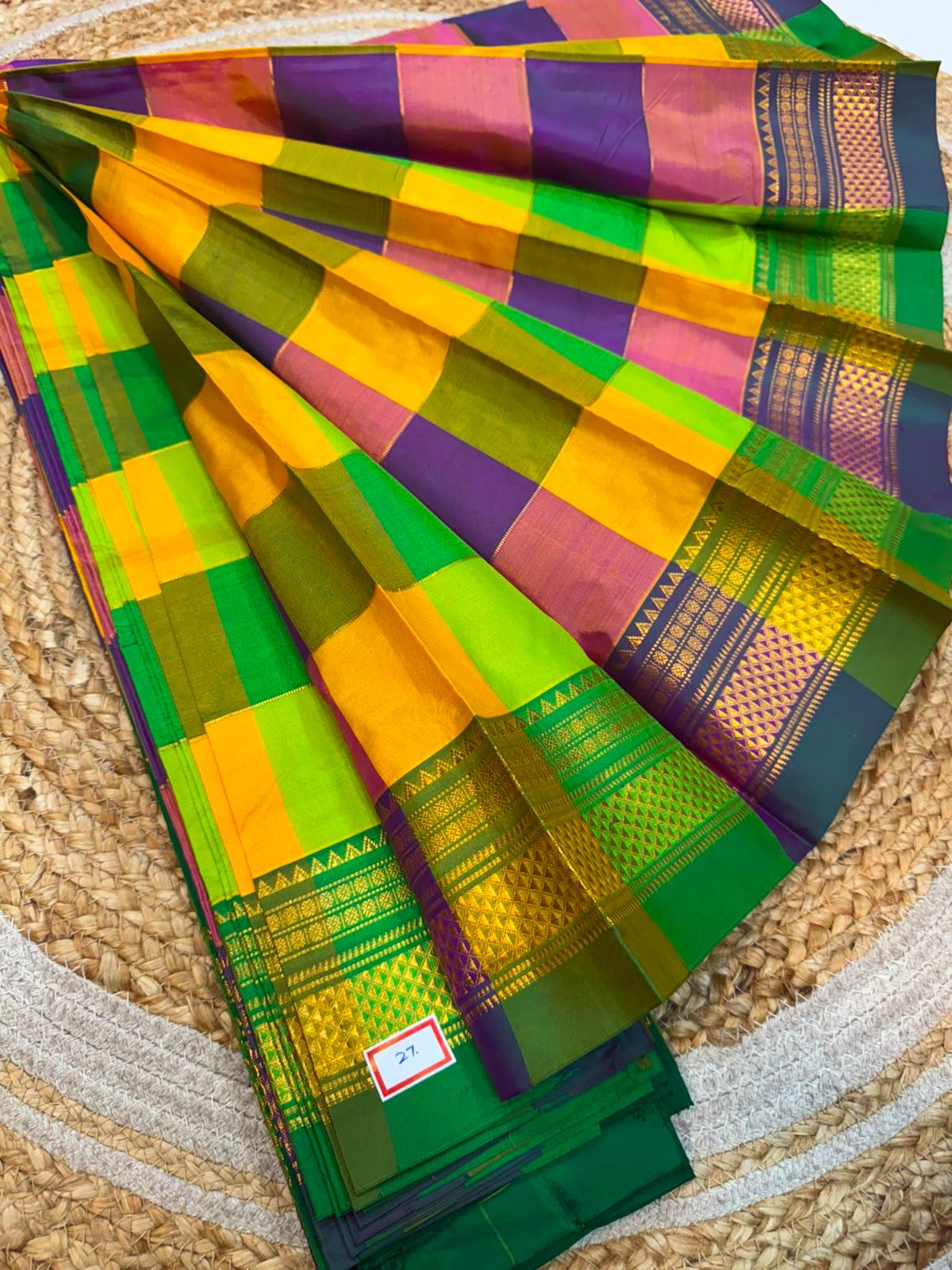 *ILKAL SAREE WITH SILK MARK* 

Exclusive premium quality pure silk Multi colour checks with zari lines design ilkal saree With Fancy Temple design Jari Pallu and contrast blouse 
6.10mtrs length 
Premium quality ilkal saree 
