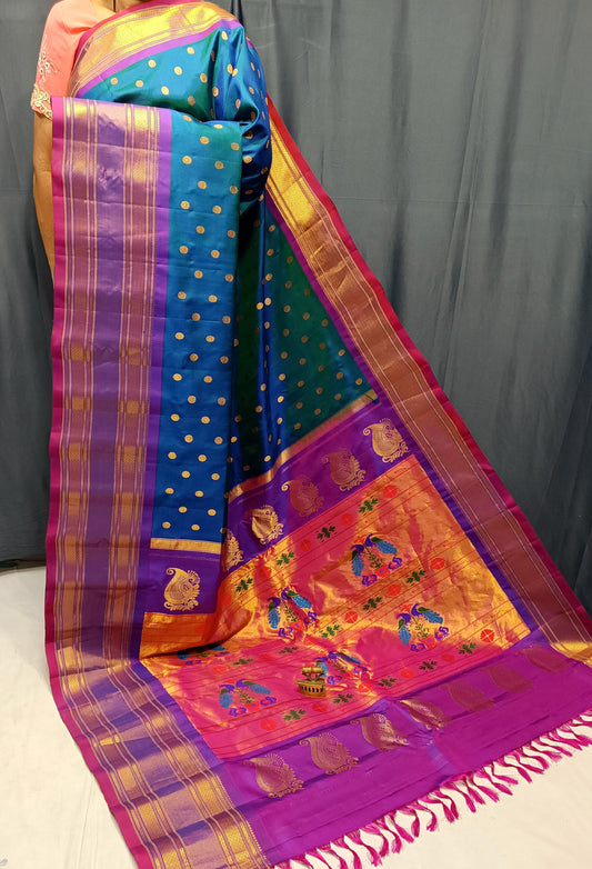 Swamini Maharani Kalanjali Paithani. 
Handmade Saree 
Pure  Silk  Material
Maharani  Pallu
All Over Butta 
Self Blouse.
Soft  Wear