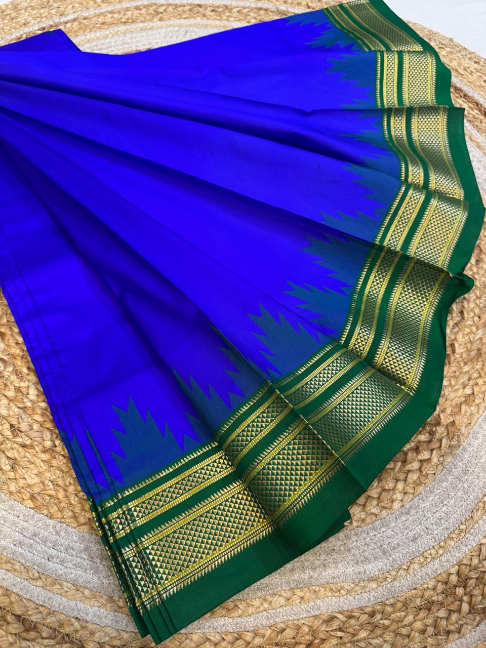 
*Big Temple Border Ilkal*

Exclusive silk ilkal saree 
Pure silk big temple border design superior quality ilkal saree
With contrast blouse 
6.10mtrs length 
Full body pure silk Border, pallu & blouse semi silk 