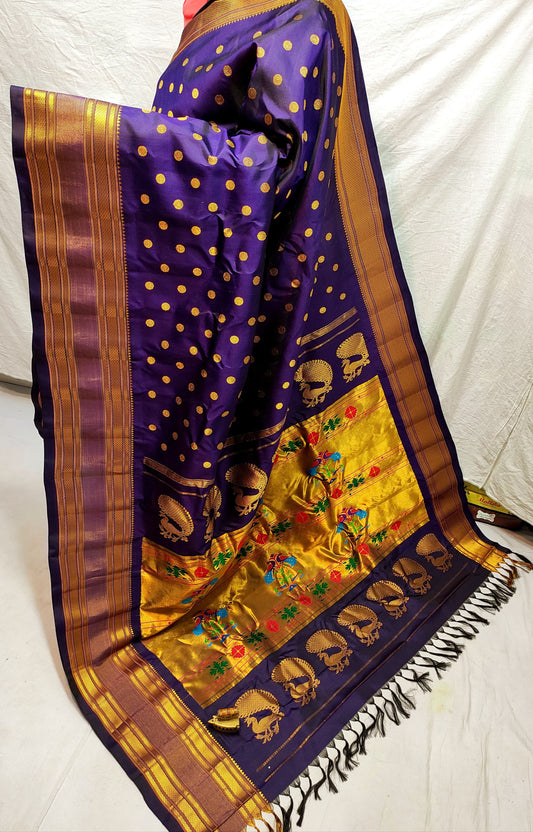 Swamini Maharani Kalanjali Paithani. 
Handmade Saree 
Pure  Silk  Material
Maharani  Pallu
All Over Butta 
Self Blouse.
Soft  Wear