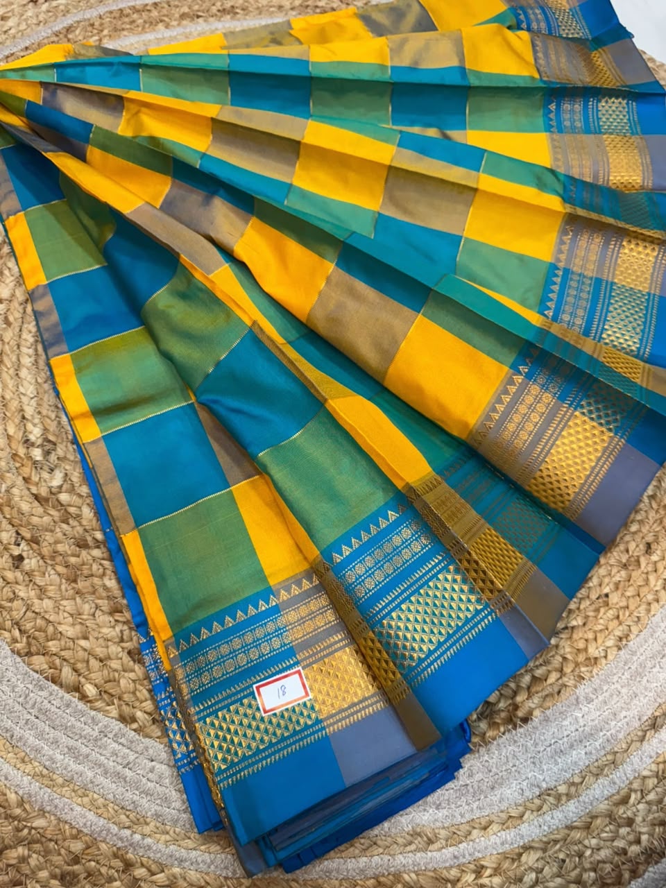 *ILKAL SAREE WITH SILK MARK* 

Exclusive premium quality pure silk Multi colour checks with zari lines design ilkal saree With Fancy Temple design Jari Pallu and contrast blouse 
6.10mtrs length 
Premium quality ilkal saree 
