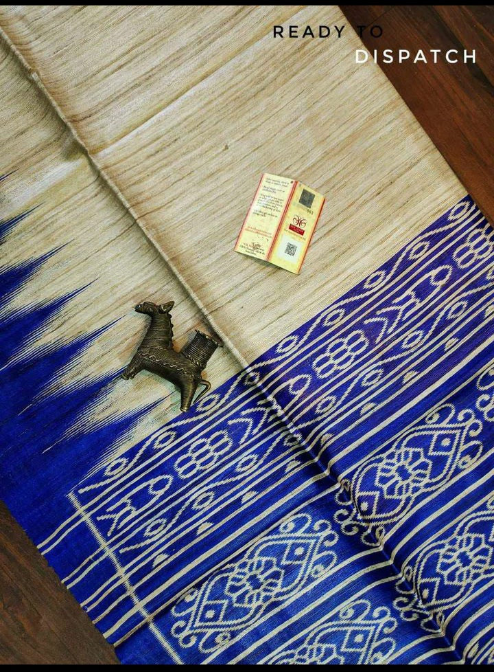 Pure tussar ghicha temple border ikkat print silk handloom saree with blouse pc.
Silk mark tag 
