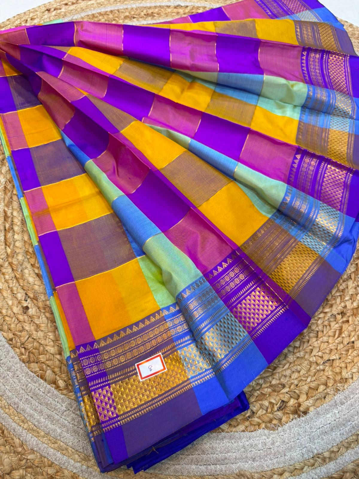 *ILKAL SAREE WITH SILK MARK* 

Exclusive premium quality pure silk Multi colour checks with zari lines design ilkal saree With Fancy Temple design Jari Pallu and contrast blouse 
6.10mtrs length 
Premium quality ilkal saree 
