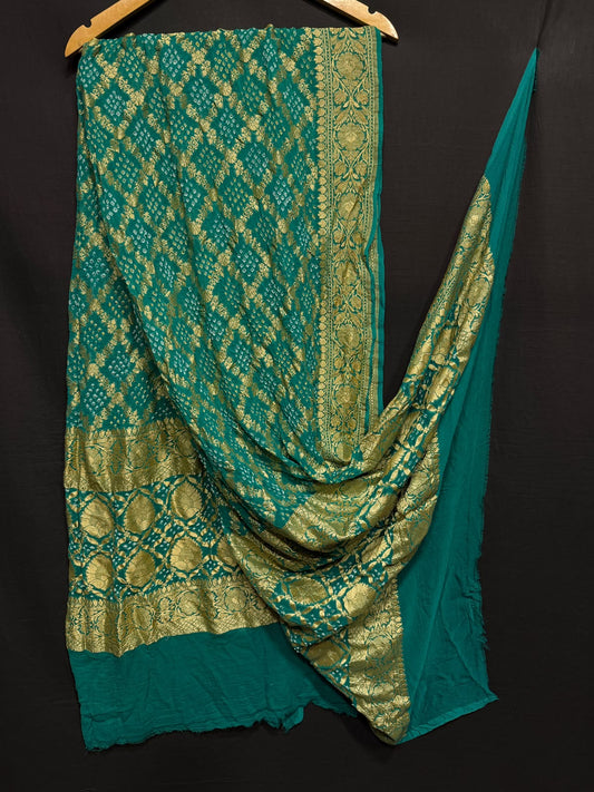 **Nim Zari Bandhej Dupatta**
- **Fabric:** handwoven Georgette
- **Design:** Beautiful Bandhej, Real Nimzari
- **Quality:** Best quality & colour 
- ** colour:** pastel & Dark
**Description:**
- **Length:** 2.50 meters, full length
- **Use:** Dress & Lehenga Choli Dupatta