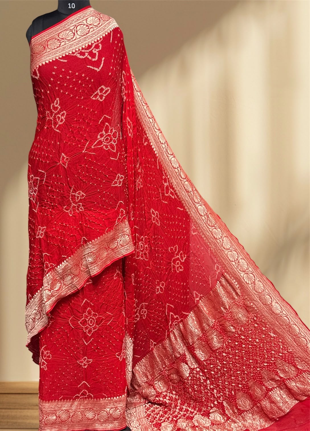 ** Banarasi Rai Bandhej Saree **

**Product Details:**
- **Fabric:** Khadi Georgette
- **Design:** Mix Pattern & Color, Real Nimzari, Beautiful Bandhej
- **Length:** 6.50 meters
- **Width:** 44-46 inches
- **Care:** Dry Clean Only