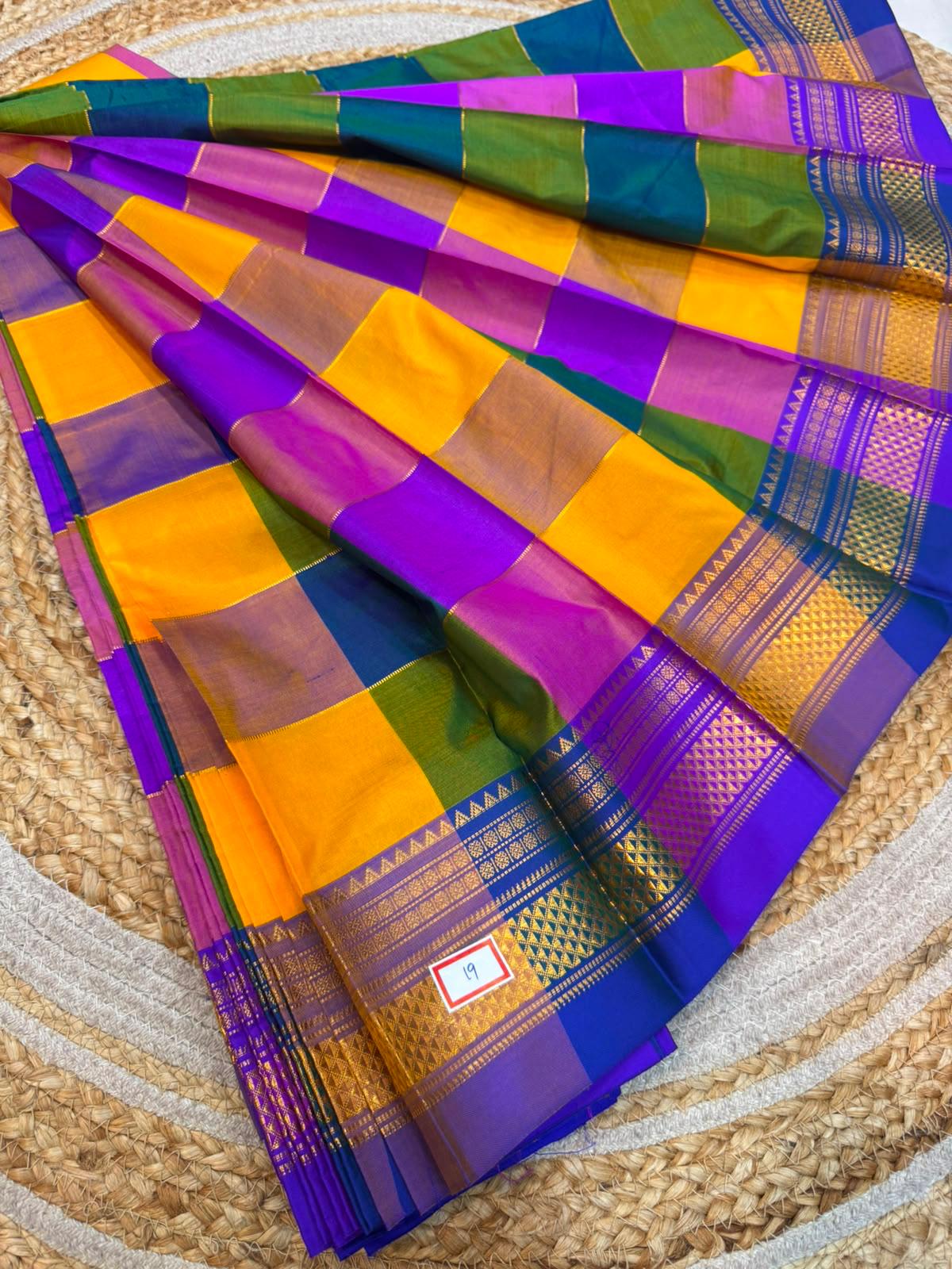 *ILKAL SAREE WITH SILK MARK* 

Exclusive premium quality pure silk Multi colour checks with zari lines design ilkal saree With Fancy Temple design Jari Pallu and contrast blouse 
6.10mtrs length 
Premium quality ilkal saree 
