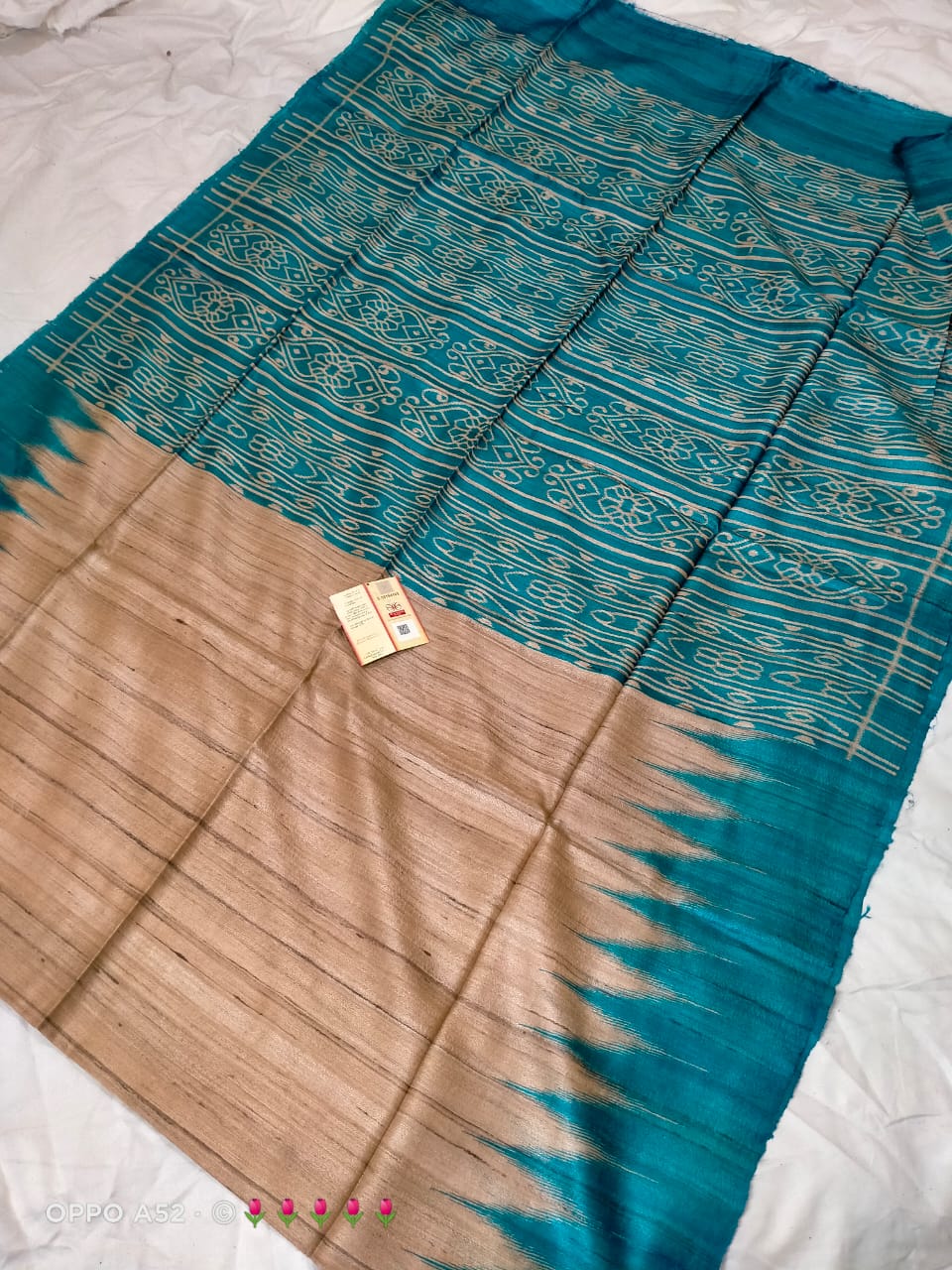 Pure tussar ghicha temple border ikkat print silk handloom saree with blouse pc.
Silk mark tag 
