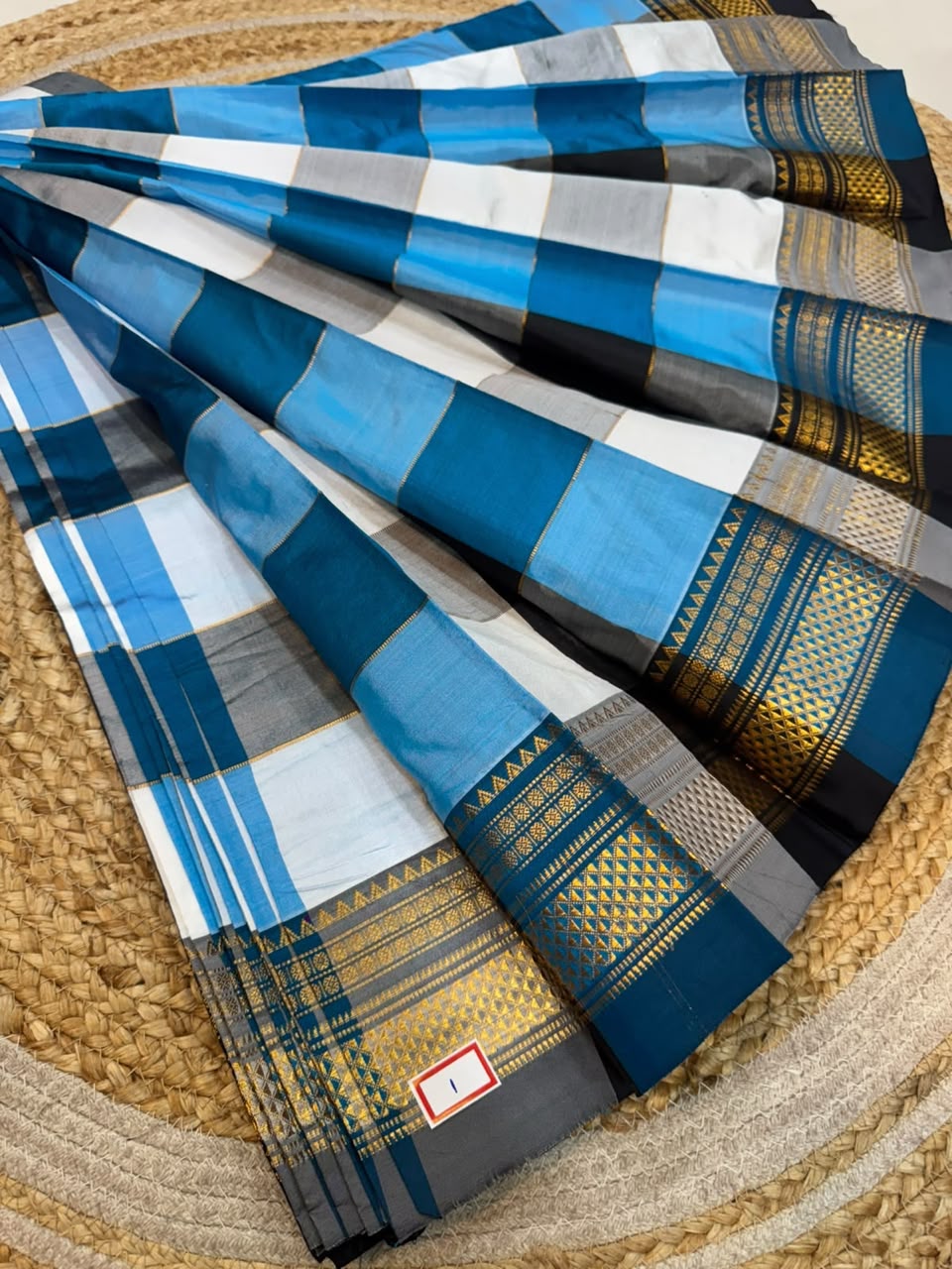 *ILKAL SAREE WITH SILK MARK* 

Exclusive premium quality pure silk Multi colour checks with zari lines design ilkal saree With Fancy Temple design Jari Pallu and contrast blouse 
6.10mtrs length 
Premium quality ilkal saree 
