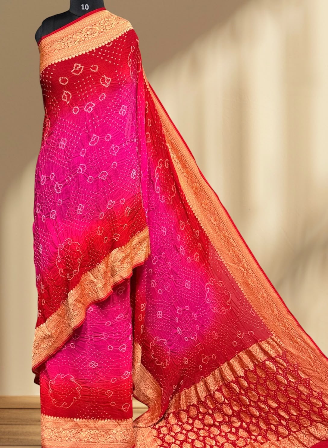 ** Banarasi Rai Bandhej Saree **

**Product Details:**
- **Fabric:** Khadi Georgette
- **Design:** Mix Pattern & Color, Real Nimzari, Beautiful Bandhej
- **Length:** 6.50 meters
- **Width:** 44-46 inches
- **Care:** Dry Clean Only
