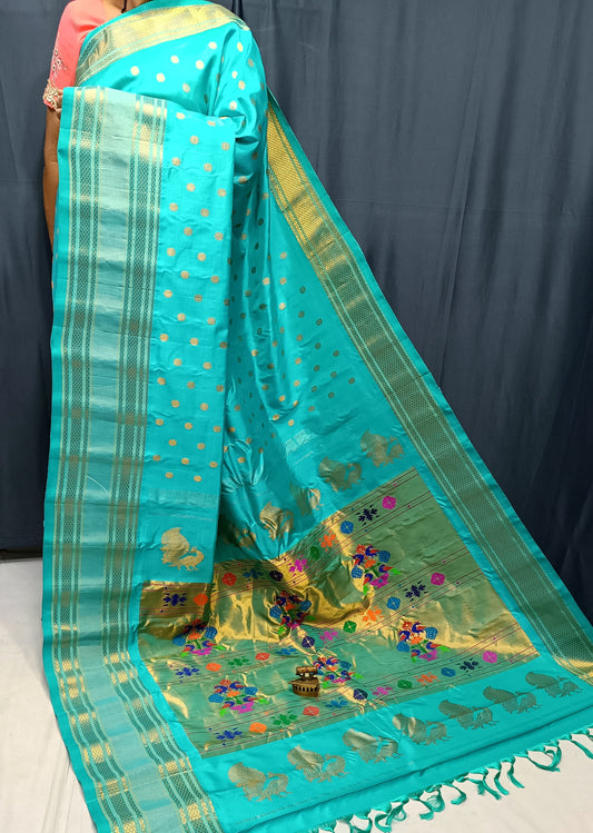 Swamini Maharani Kalanjali Paithani. 
Handmade Saree 
Pure  Silk  Material
Maharani  Pallu
All Over Butta 
Self Blouse.
Soft  Wear