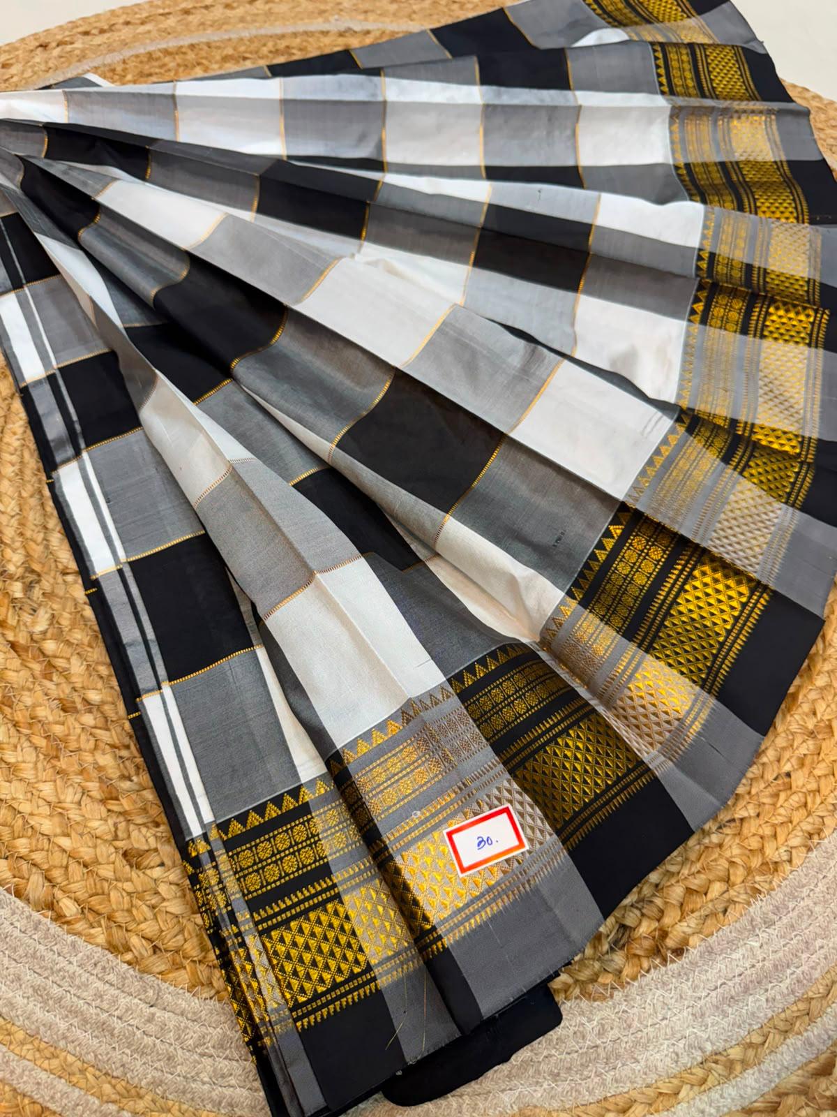 *ILKAL SAREE WITH SILK MARK* 

Exclusive premium quality pure silk Multi colour checks with zari lines design ilkal saree With Fancy Temple design Jari Pallu and contrast blouse 
6.10mtrs length 
Premium quality ilkal saree 
