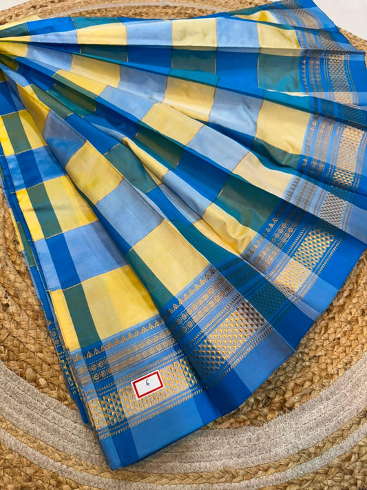 *ILKAL SAREE WITH SILK MARK* 

Exclusive premium quality pure silk Multi colour checks with zari lines design ilkal saree With Fancy Temple design Jari Pallu and contrast blouse 
6.10mtrs length 
Premium quality ilkal saree 
