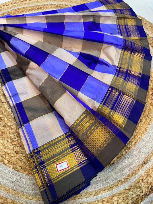 *ILKAL SAREE WITH SILK MARK* 

Exclusive premium quality pure silk Multi colour checks with zari lines design ilkal saree With Fancy Temple design Jari Pallu and contrast blouse 
6.10mtrs length 
Premium quality ilkal saree 
