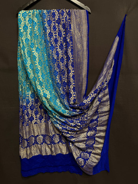 **Nim Zari Bandhej Dupatta**
- **Fabric:** handwoven Georgette
- **Design:** Beautiful Bandhej, Real Nimzari
- **Quality:** Best quality & colour 
- ** colour:** pastel & Dark
**Description:**
- **Length:** 2.50 meters, full length
- **Use:** Dress & Lehenga Choli Dupatta